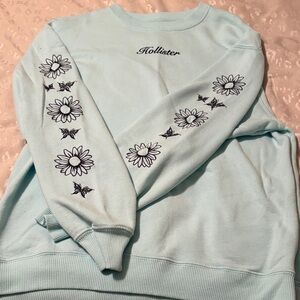 Hollister Light Blue Sweatshirt with Floral Design